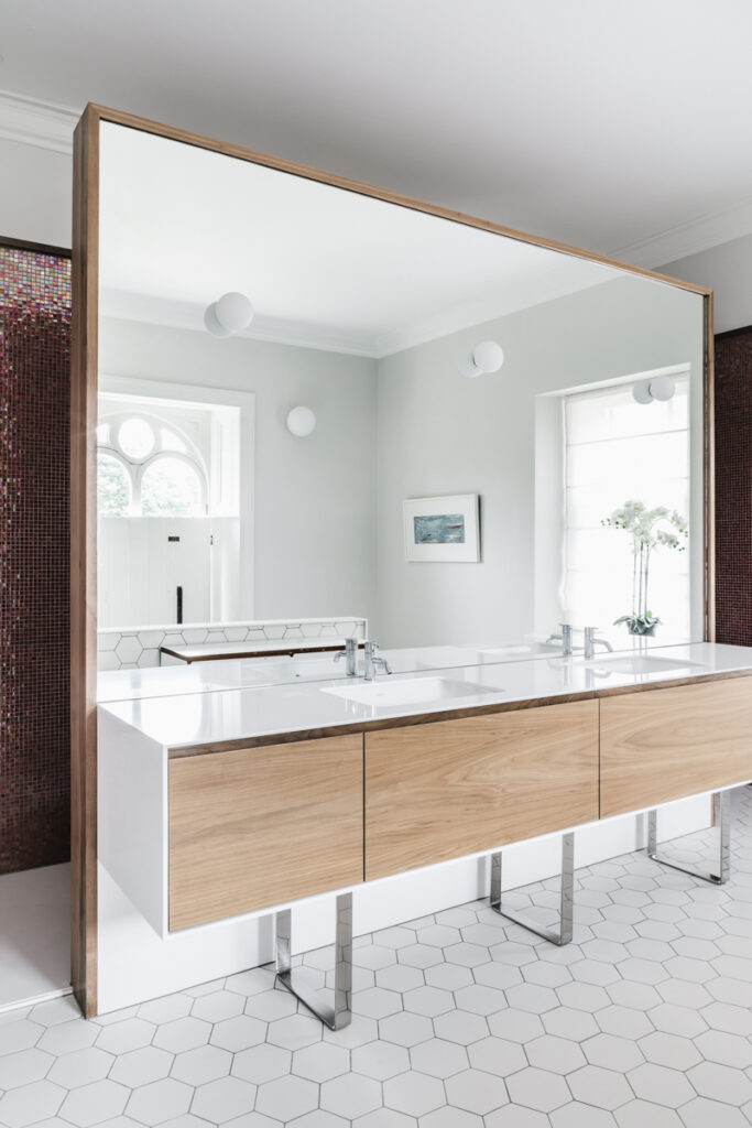 Modern bathroom with hexagon shaped floor tiles at Clifton Villa in Bristol