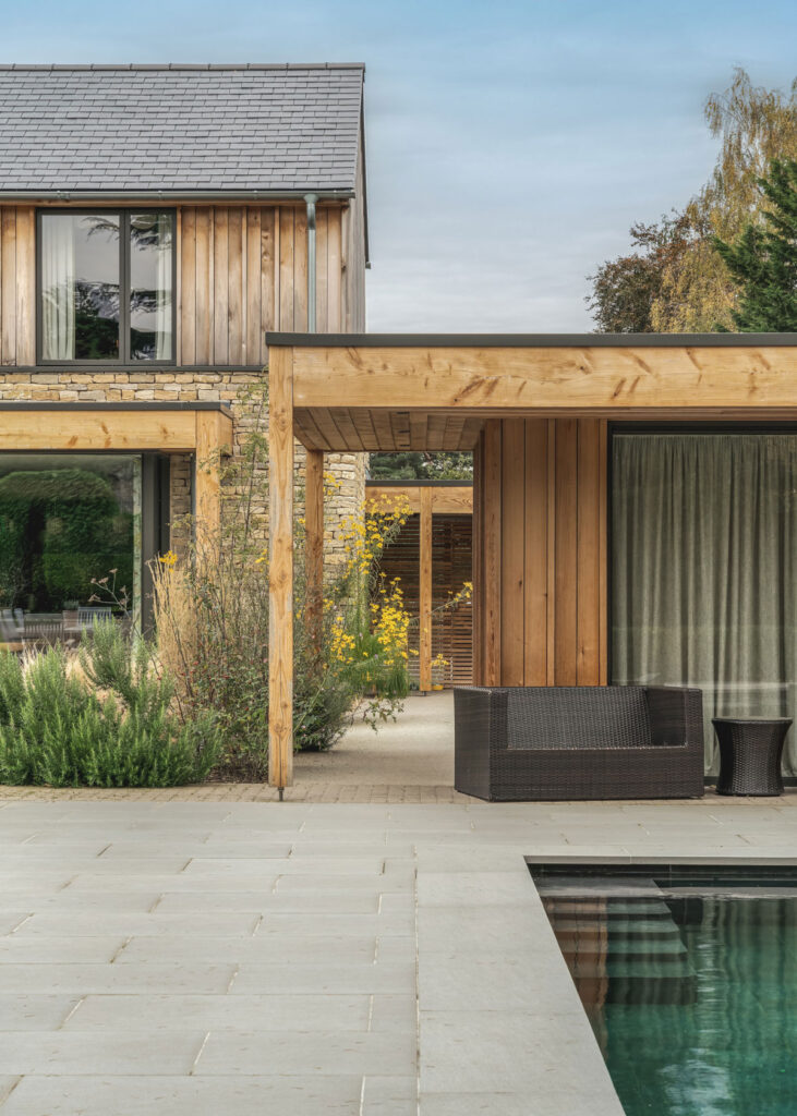 View of Park House replacement dwelling in Cheltenham with a swimming pool