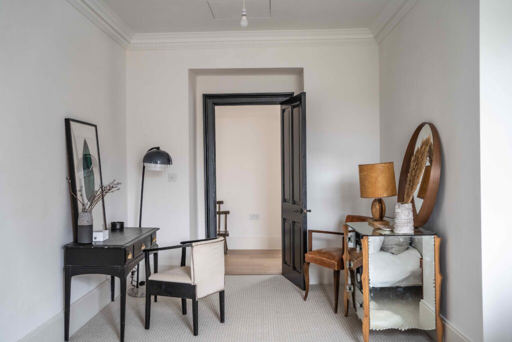 Interior with a dressing table at The Priory in Tetbury, Cotswolds
